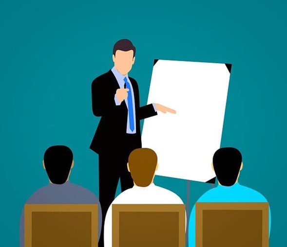 executive coach qui effectue une présentation